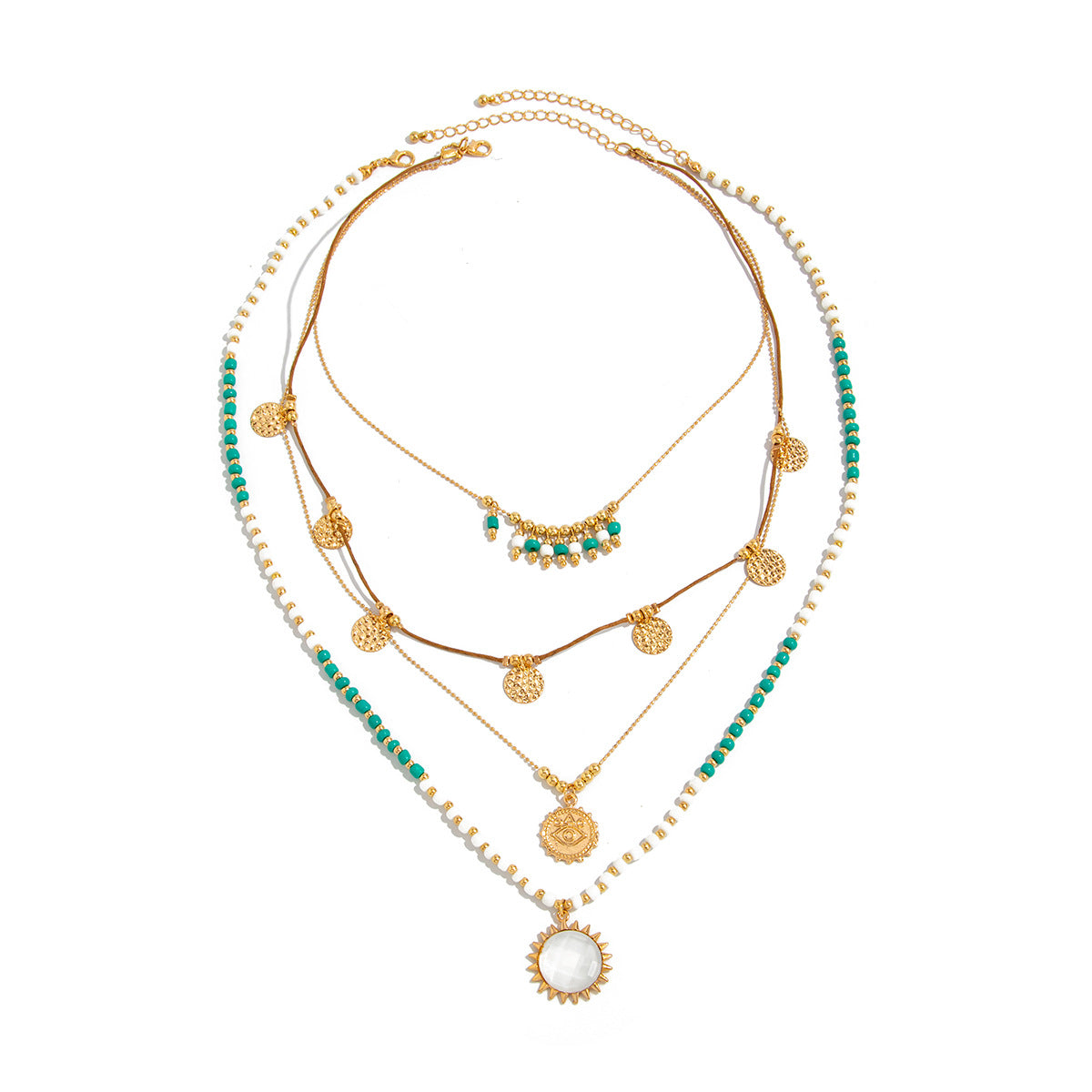 Gold and turquoise layered bohemian necklace laid flat showing three strands