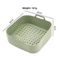 Avocado green large square silicone air fryer liner tray with a studded base, about 20 by 20 cm