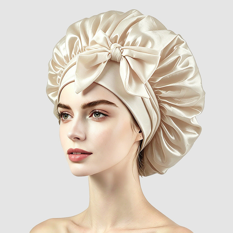 Roomy satin sleep cap with a bow tie band, one size for long or thick hair