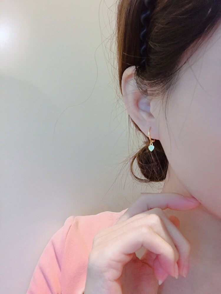 Ear cuff resting on its small velvet jewelry pouch