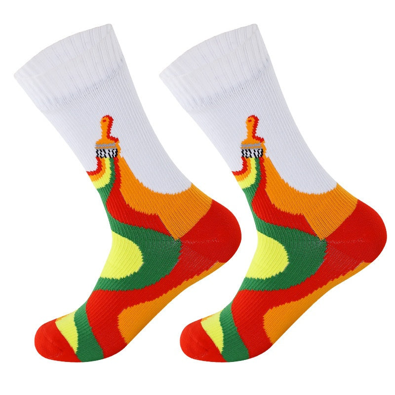 Waterproof crew socks with a white cuff and an orange, red, green and yellow paintbrush design, size XS 33-36
