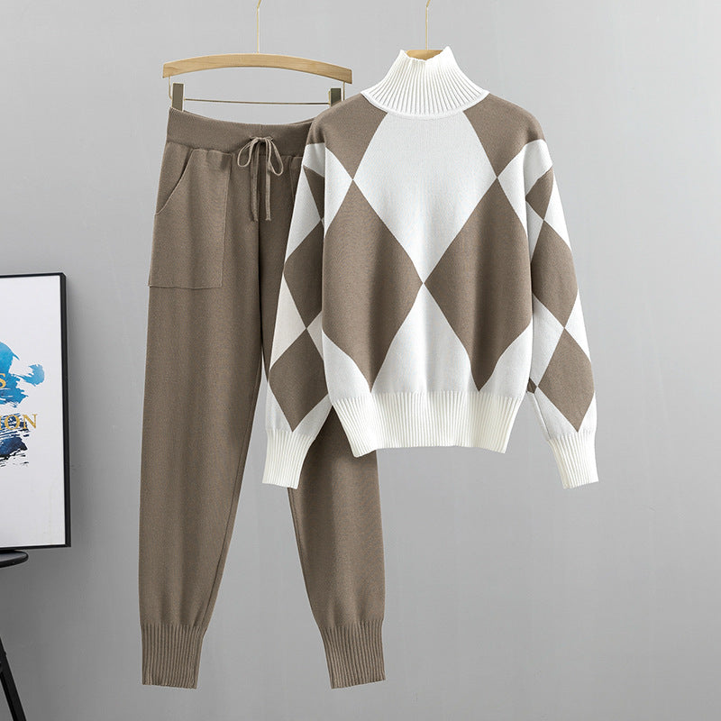 Khaki argyle knit sweater and jogger pants set with white panels on a hanger, size M option