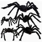 Hairy black Halloween spider prop with red eyes, flocked body and eight posable bendable legs