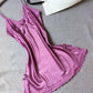 Light purple satin slip nightdress with lace at the neckline and hem, flat on a gray cloth, option photo for size M