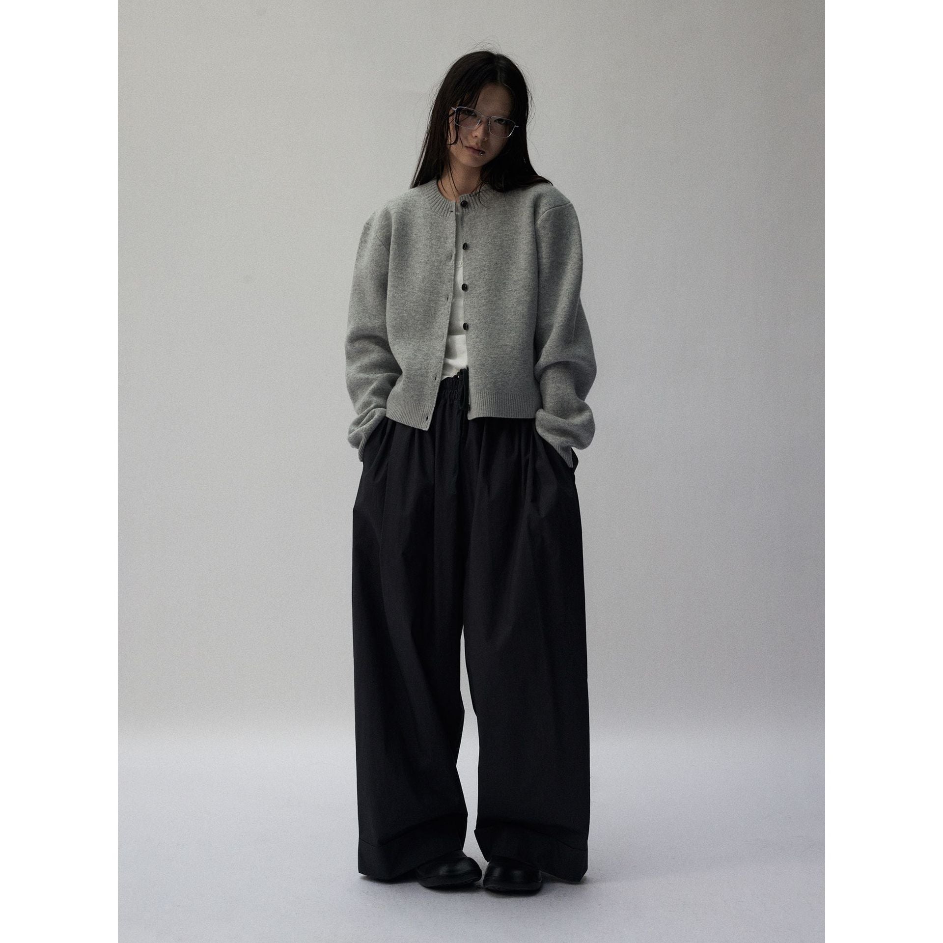Cropped knit cardigan shown for scale and overall fit reference