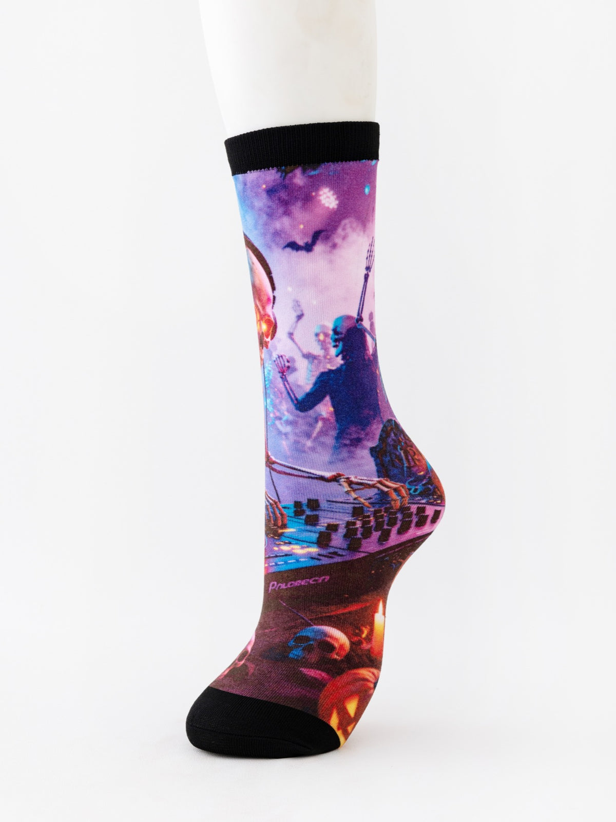 Mid-calf sock on a model foot printed with a skeleton DJ at a mixing desk under a purple sky