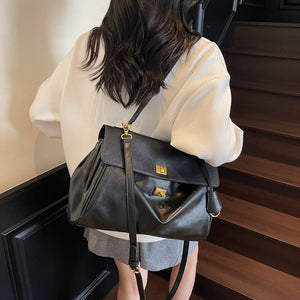 PU tote bag carried on the shoulder with adjustable strap