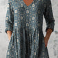 Boho print V neck tunic top in a scattered floral digital print