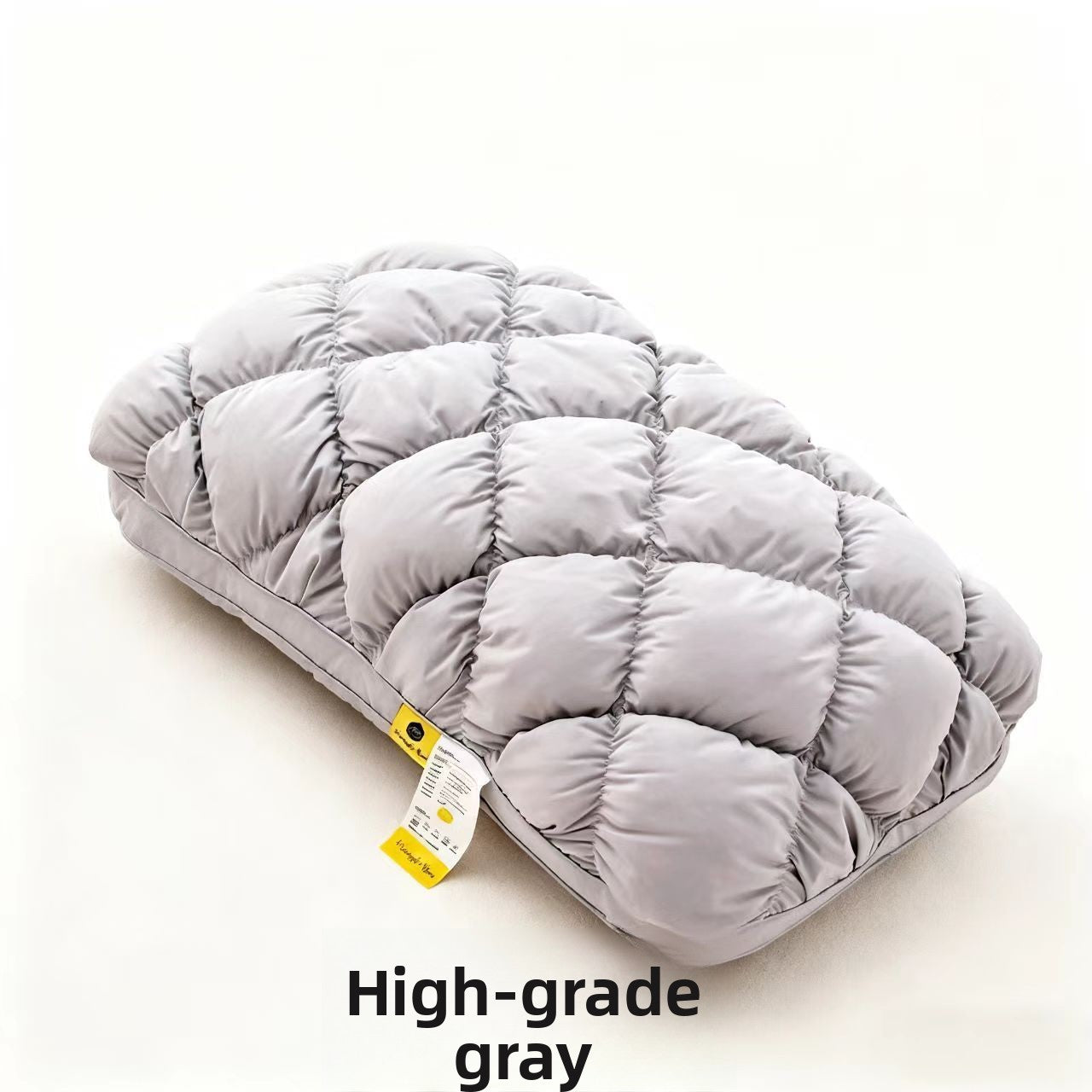 Light gray slow rebound bed pillow, box quilted, angled view