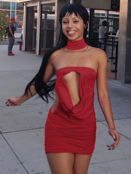 Red backless dress worn for an evening out, open back on show