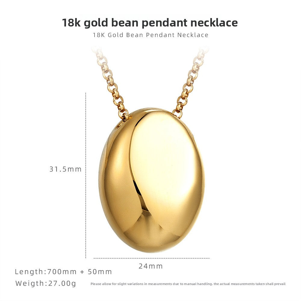 Drop pendant necklace held in hand for scale reference