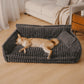 Sofa style plush pet bed with a raised bolster on three sides and a loose cushion, for cats and dogs