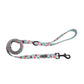 Watermelon print dog leash coiled with padded handle and swivel snap clip