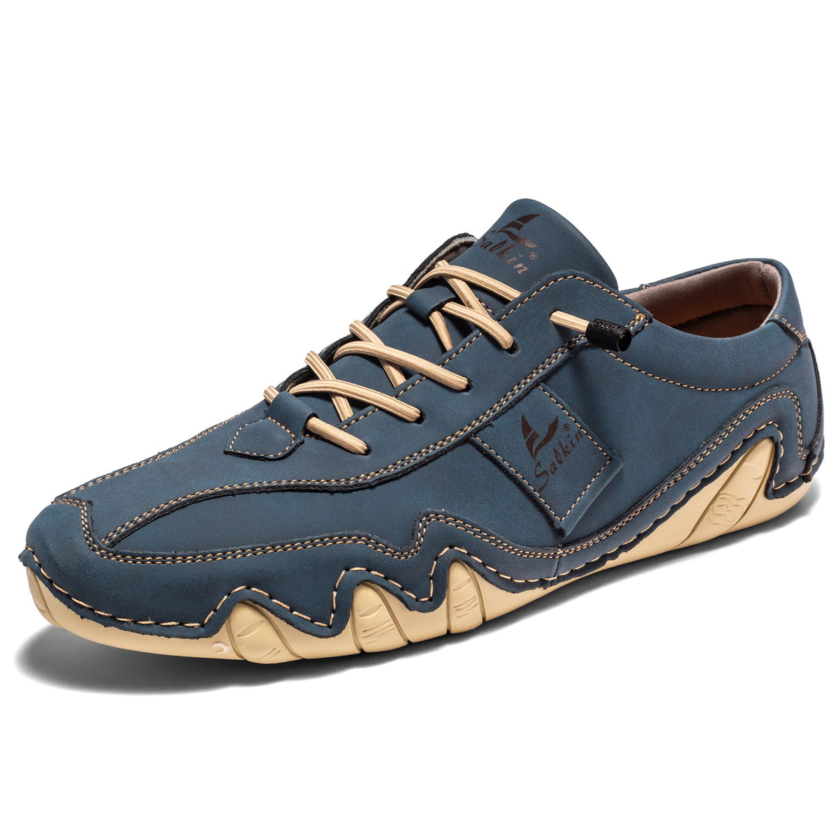Dark blue microfiber low-top lace-up casual shoe with a wavy cream lug sole, three quarter view, size option 49
