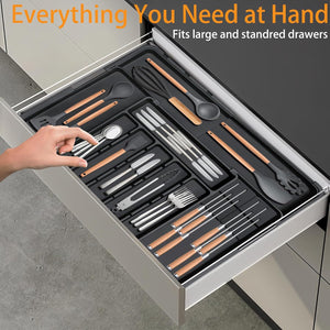 Black PP plastic kitchen drawer organizer with divided compartments, top view