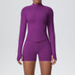 Fitted ribbed seamless zip jacket with a stand collar shown on a female model