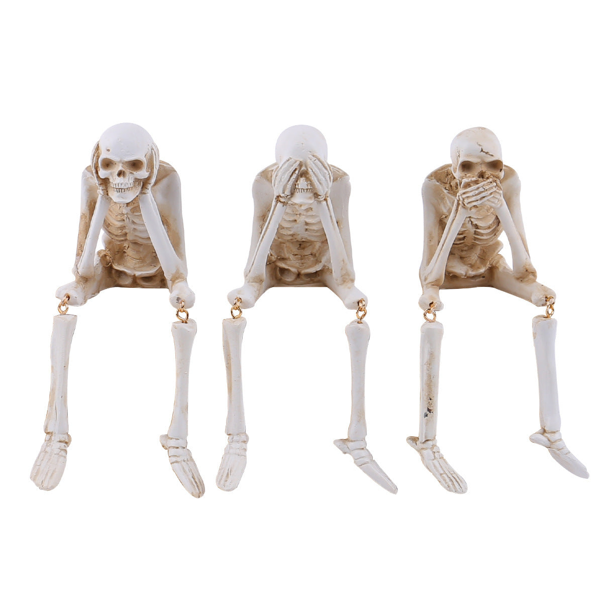 See no evil resin skeleton figurine covering its eyes