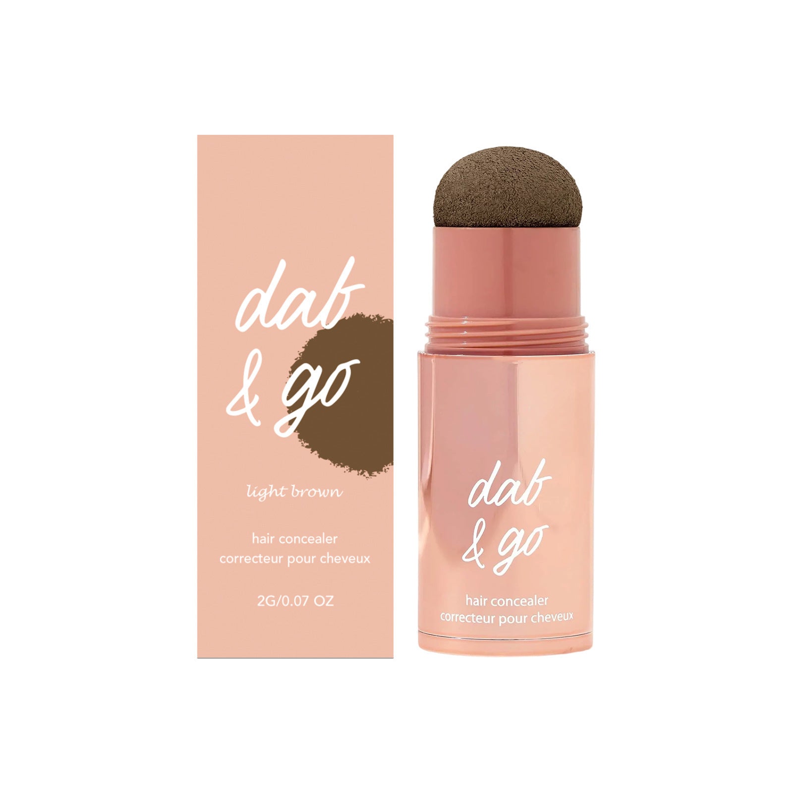 Hair root and part line cover powder in a rose gold twist tube with a dome sponge tip