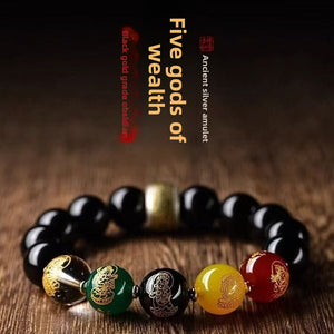 Five-Way God of Wealth obsidian look bracelet shown on plain background