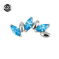Titanium piercing stud shown with the stone top and threaded post separated