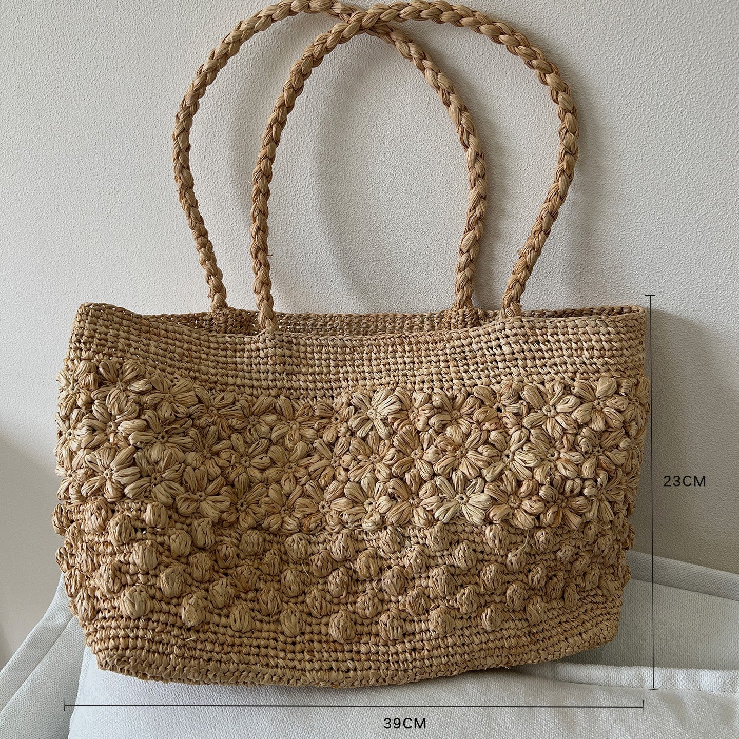 Raffia Hand-Woven Tote Bag | soft lighting studio shot