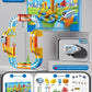 Ninety piece magnetic track set laid out with its box, one railcar, road signs and support pieces