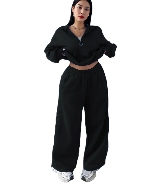 Black cropped half-zip sweatshirt and wide-leg sweatpants set on a model, size XL option