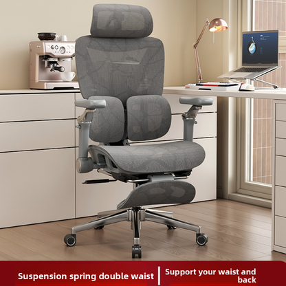 Grey mesh office chair beside a desk, headrest raised and the mesh footrest folded under the seat