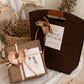 Caramel Series option, wooden gift box with a caramel orchid flower and card beside a brown bag with a cut-out handle