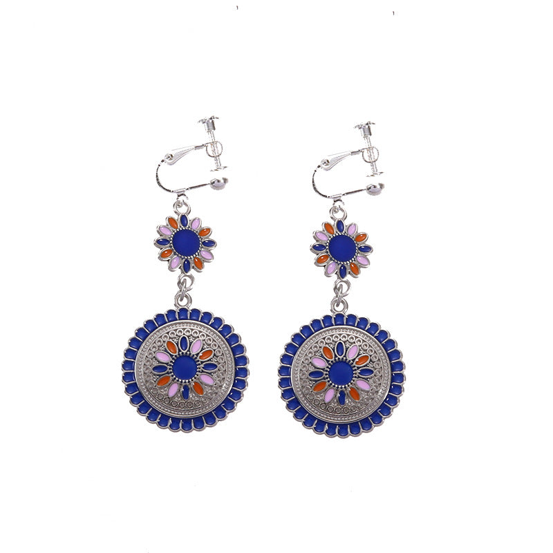 Vintage boho tassel clip-on earrings for non pierced ears, zinc alloy drop pair photographed on white background