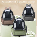 Three capsule pet carrier backpacks in brown, gray and army green with clear dome windows on a pastel stand