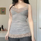 Side view of the gray slim camisole with narrow straps and lace V-neck trim