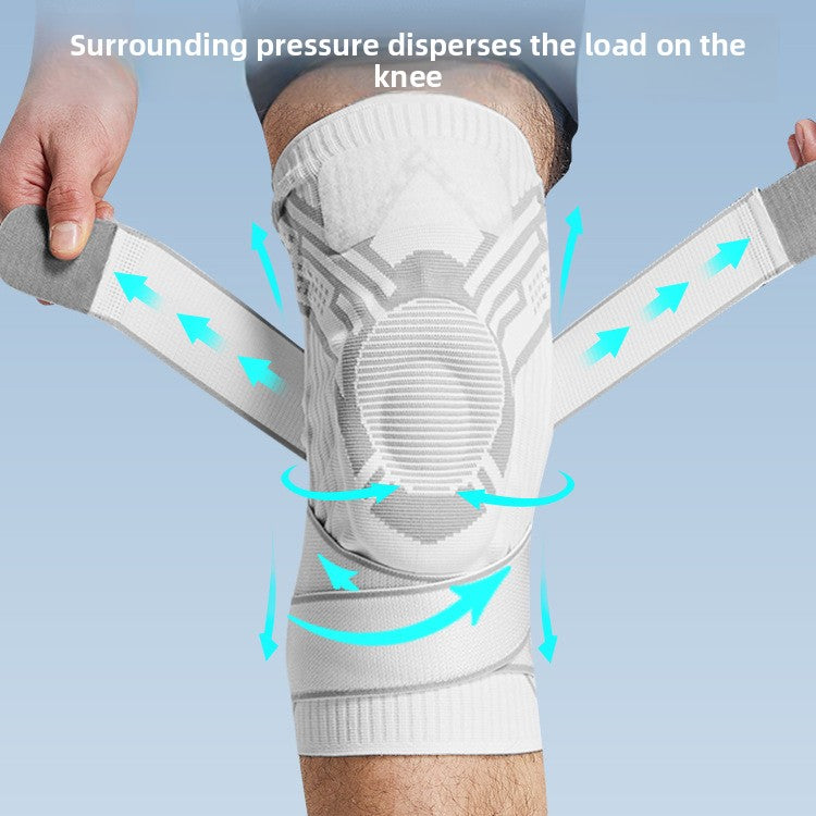 Sports knee brace with reinforced padded kneecap panel and adjustable support strap