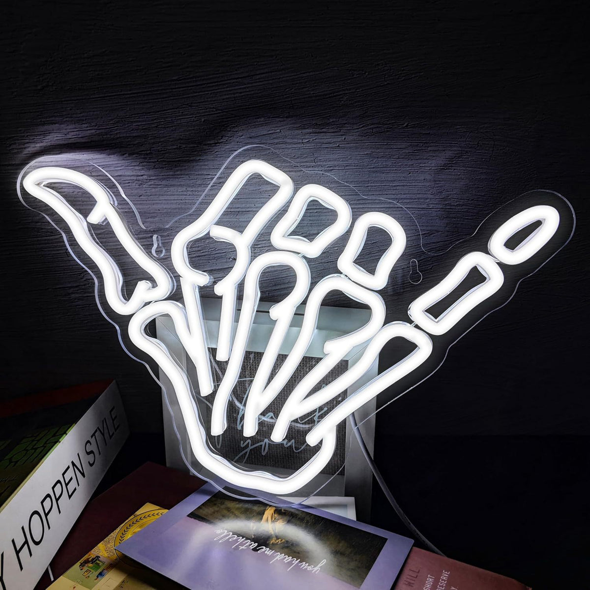 LED neon wall light sign, lit in a studio corner