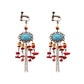 Vintage boho tassel clip-on earrings for non pierced ears, zinc alloy drop pair photographed on white background
