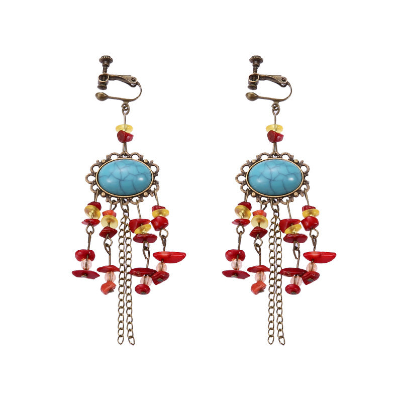 Vintage boho tassel clip-on earrings for non pierced ears, zinc alloy drop pair photographed on white background