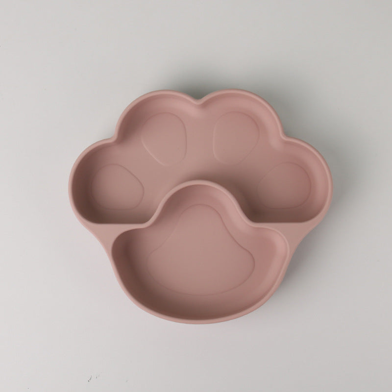 Pink bear paw plate alone, with a wide pad and a toe section, on a gray background