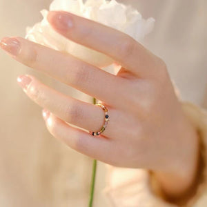 Side profile of the beaded stretch ring showing the low-profile tourmaline beads