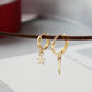 Pair lifted up to the light with the drop chain hanging in a straight line