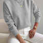 Light Gray half-high neck pullover sweater with long sleeves worn with white trousers, size L variant image