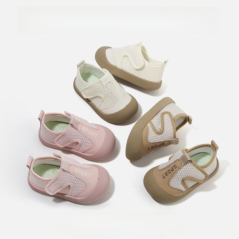Beige toddler breathable mesh slip on sports shoe showing the soft flexible rubber sole and SPORT trim