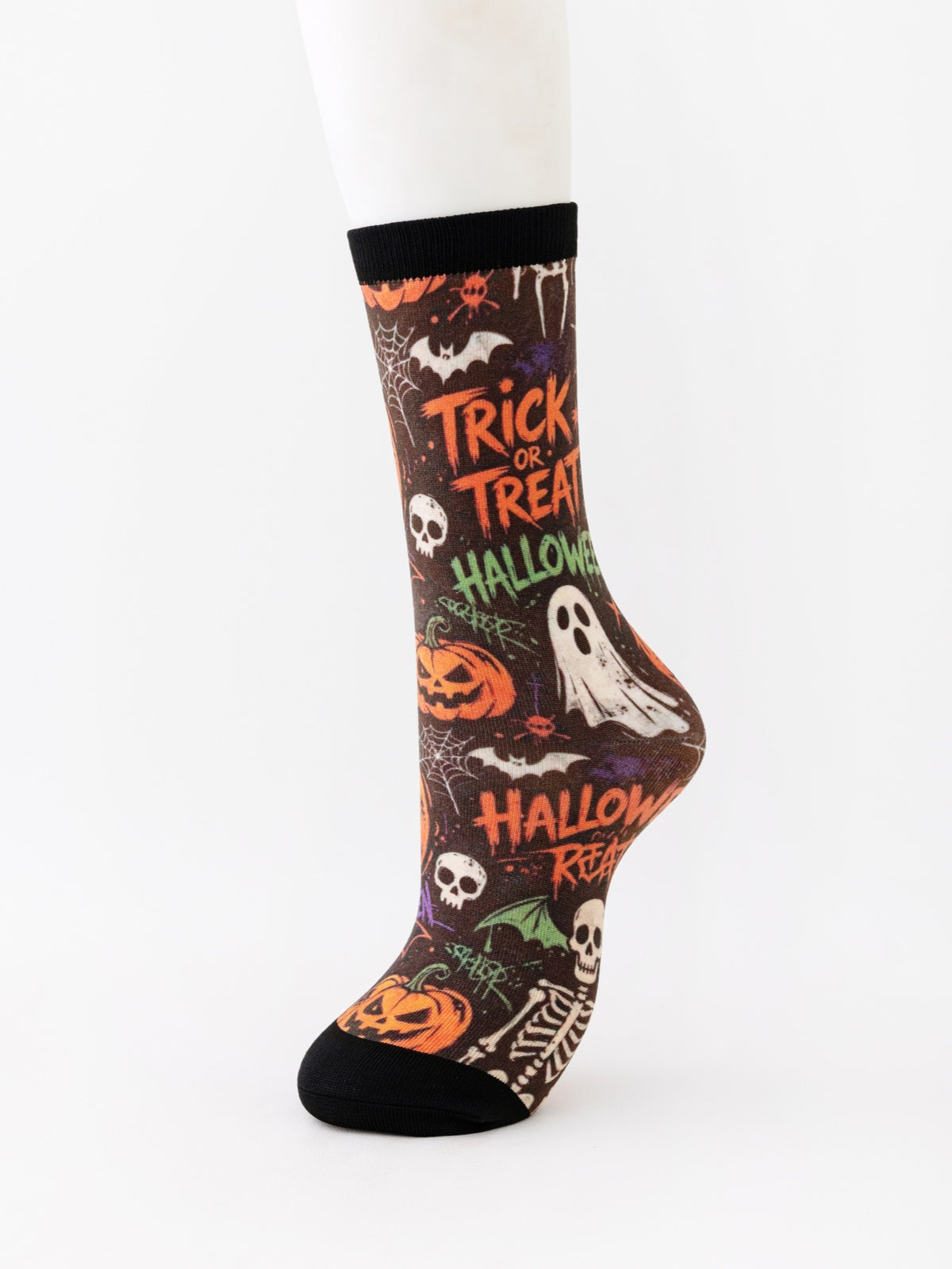 Mid-calf sock on a mannequin printed with Trick or Treat lettering, ghosts, skulls and pumpkins