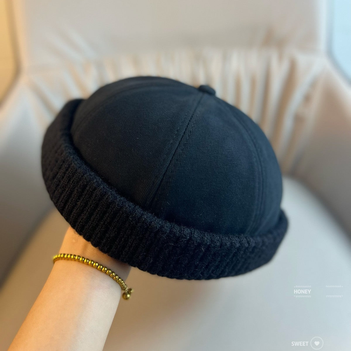 Dome beanie with a folded ribbed knit cuff in a neutral washed shade