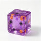 Glitter Halloween squishy cube printed with orange pumpkins purple skulls and spiders