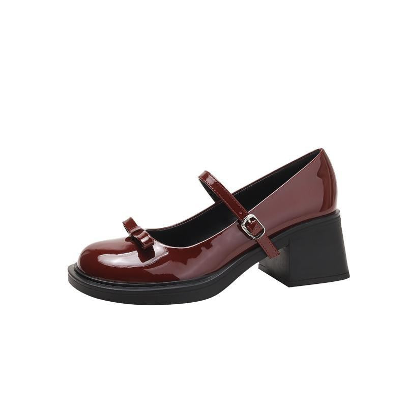 Top down view of Mary Jane shoe showing round toe and vamp bow detail