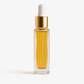 Side angle of the 20ml hair nourishing oil bottle showing its slim shape