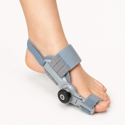 Hinged big toe straightener bunion splint worn on a foot with adjustment dial