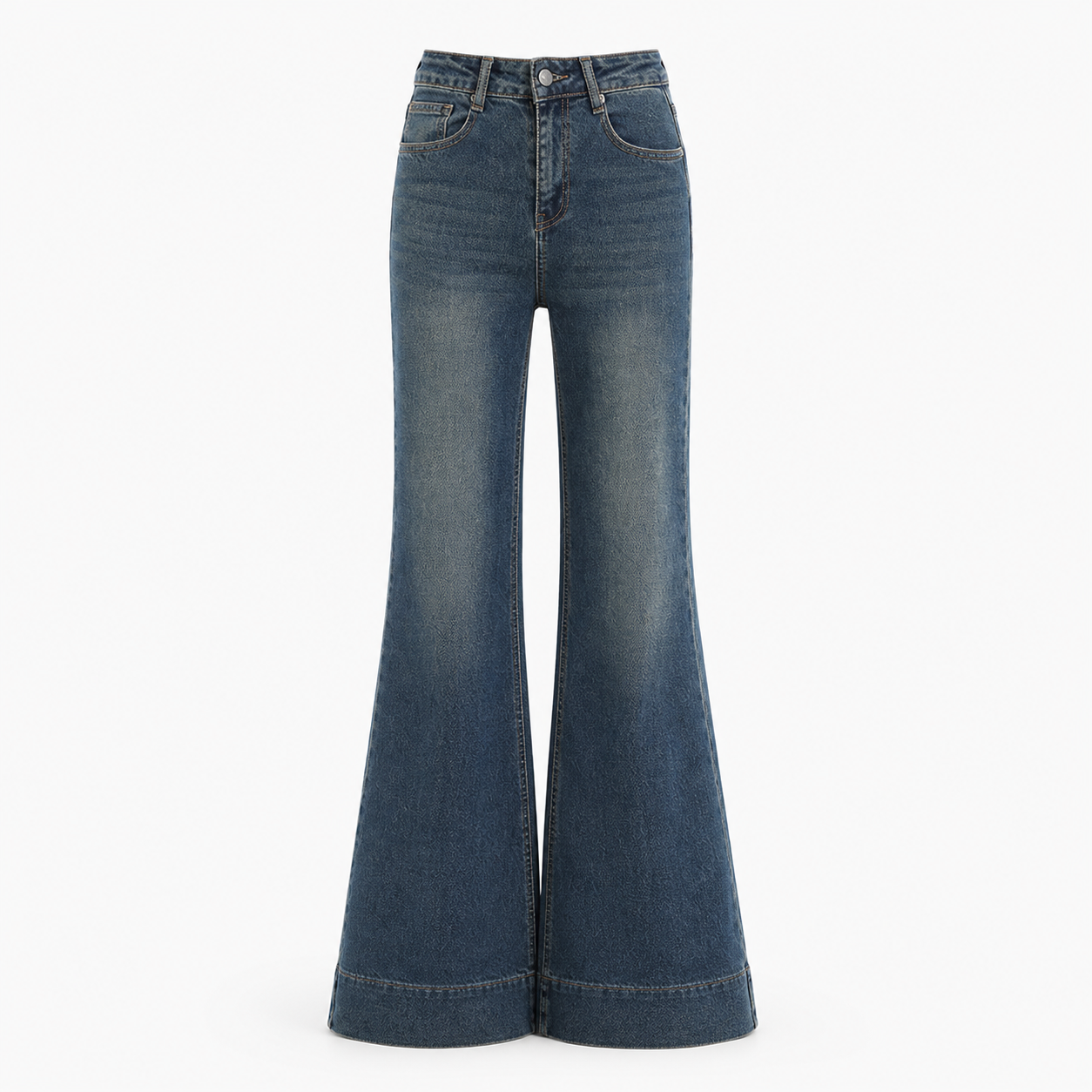 High waist flared denim trousers worn with white sneakers on the street