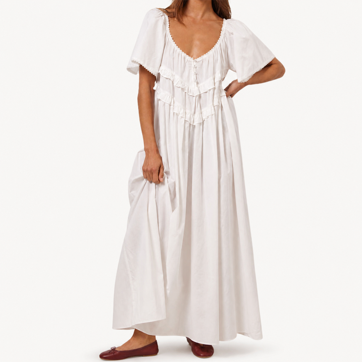 Back view of the dress showing tied waist and clean shoulder line