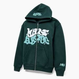 Woman wearing a forest green MARS BLOC graffiti zip-up hoodie with the hood up